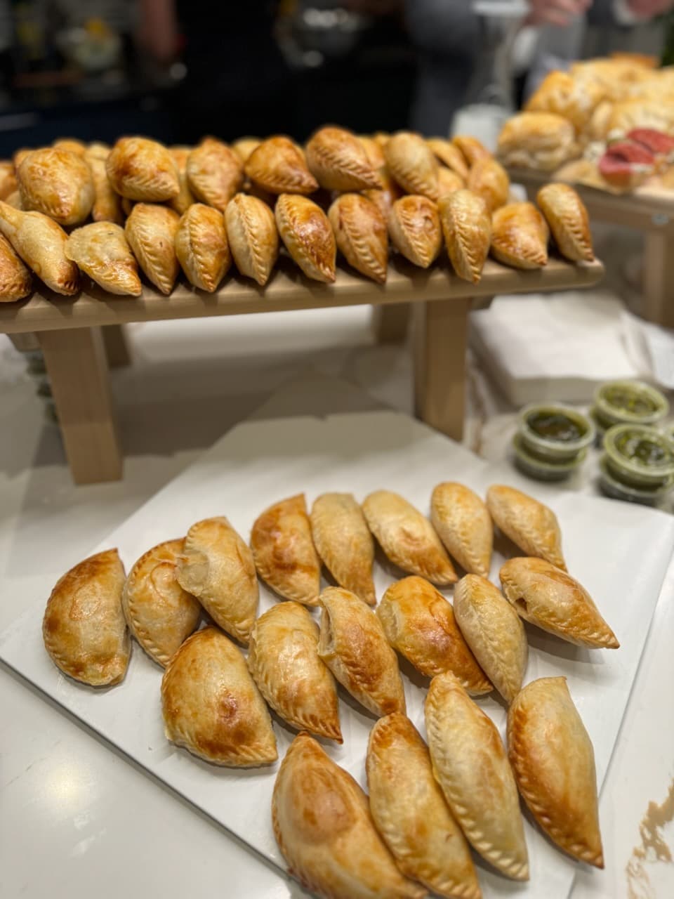 A tray of an assortment of traditional latin pastries.