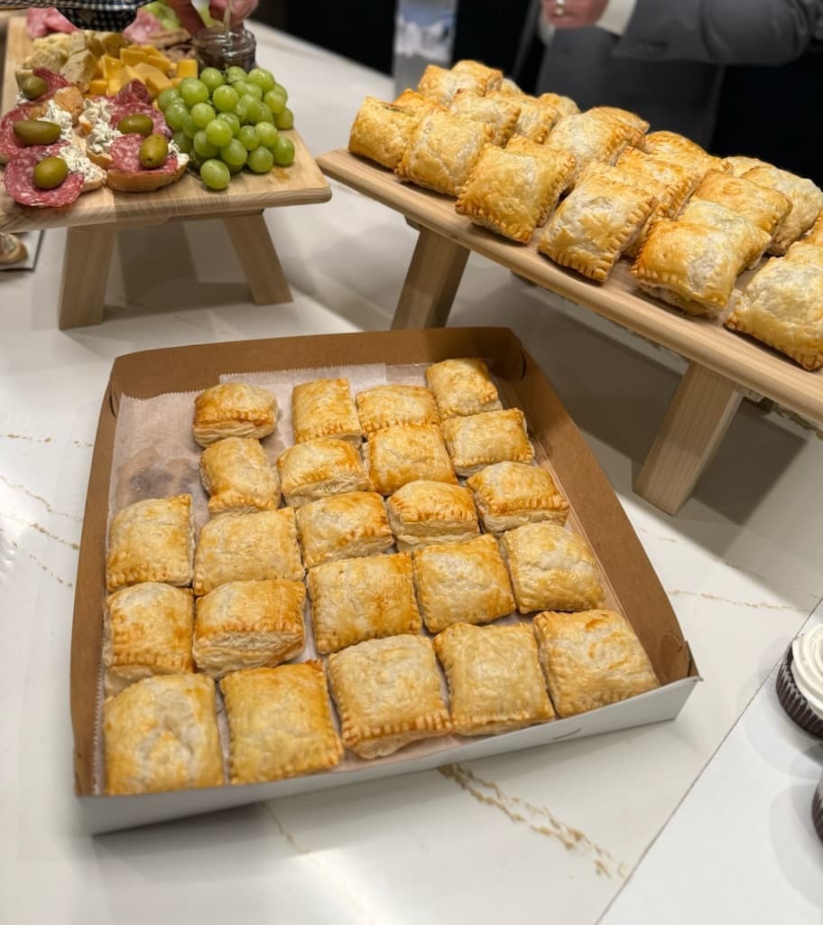 A tray of an assortment of traditional latin pastries.